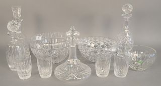 Eleven piece crystal lot to include four Waterford decanters, four Waterford glasses, and a Waterford bowl, along with two Tiffany a...