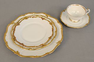 German china dinnerware set, settings for eleven with 77 total pieces.