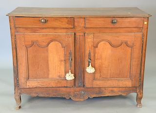 Louis XV fruitwood sideboard having two drawers and two doors, 18th century. ht. 43 in., top: 24 1/2in x 60 in.