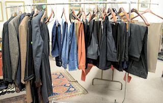 Rack of men's clothing to include Paul Stuart and Ermenegildo Zegna pants, size 38-42, Paul Stuart coats, Polo jacket, and a Loro Pi...