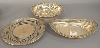Set of three sterling dishes to include bread bowl with reeded sides, lg. 10 1/2in.; reticulated plate, dia. 9 1/2in.; and a bowl wi...