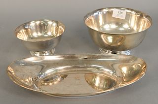 Three piece sterling silver lot to include two Revere style bowls and an oval bread plate. 26.4 troy ounces