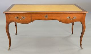 Louis XV style custom fruitwood desk with inset leather top and side pull out slide. ht. 30 1/2 in., top: 31" x 59"