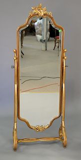 Louis XV style gilt decorated cheval mirror. ht. 69 in., wd. 28 in.