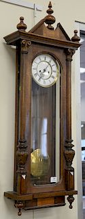 Vienna regulator clock with double brass weights. ht. 43 in., case wd. 13 in.
