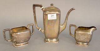 Three piece sterling silver tea set, teapot ht. 7 3/4 in., 22.3 troy ounces.
