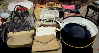Group of purses and hats to include two Rene leather purses, Frederic Fekkai handbag, Tracey Tooker hat, Brenda Lynn hat, group of p...
