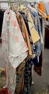 Lot of ten women's silk kimonos, along with six silk shawls.