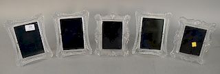 Group of 5 Waterford crystal picture frames in two styles. 7 3/4" x 6 1/2" to 8 1/2" x 6 1/2"