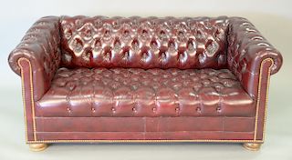 Hancock & Moore leather Chesterfield style sofa (one button missing). ht. 29 in., lg. 66 in.