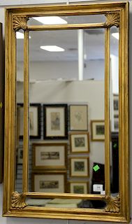 Pair of contemporary gold framed rectangular mirrors, 35.5" x 21.25".