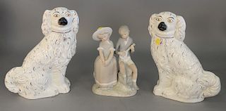 Group of eleven pieces to include pair of large 19th century Staffordshire spaniels (ht. 12 in.); pair of porcelain figural lamps; d...