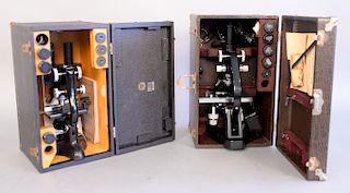 Two early microscopes, Leitz Brass monocular microscope in fitted box and a Bausch and Lomb binocular microscope in box.