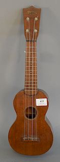 CF Martin ukulele, four string mahogany, good condition, stamped on inside C.F.Martin, Nazareth PA made in USA,. lg. 21 1/2 in.