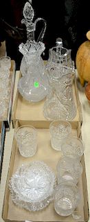 Eighteen piece glass lot to include two pitchers, cruet, vase, small dish, under plate, and twelve tumblers, seven of which are in...
