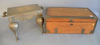 Two piece lot to include brass bound lift top box (ht. 9 1/4 in., lg. 24 in.) and a brass trivet, ht. 10 1/2 in.