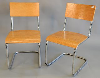 Set of ten mid century side chairs with chrome frames.