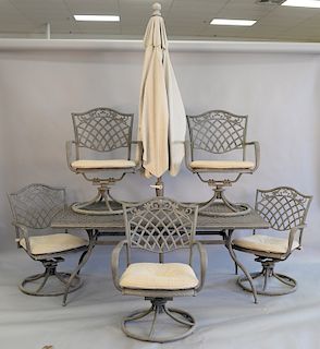 Seven piece mesh metal outdoor patio set with six swivel armchairs. table ht. 28 1/2 in., top: 37" x 68"