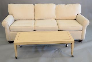 Two piece lot to include Sleepable Sofas sleeper sofa along with a contemporary coffee table, sofa length 80 inches; coffee table he...