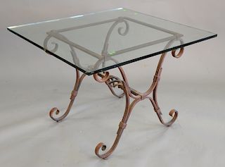 Glass top table with iron base. ht. 28 in. top: 37 1/2" x 39 1/2"