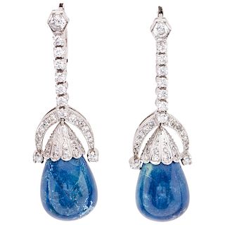 A lazurite and diamond palladium silver pair of earrings.