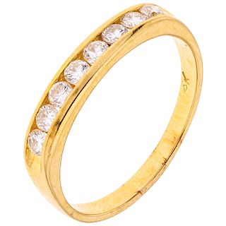 A diamond 18K yellow gold half eternity ring.