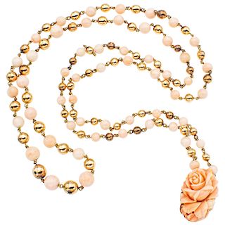 A coral 14K and 10K yellow gold necklace.