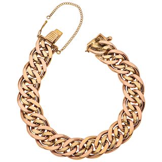 An 18K rose and yellow gold bracelet.
