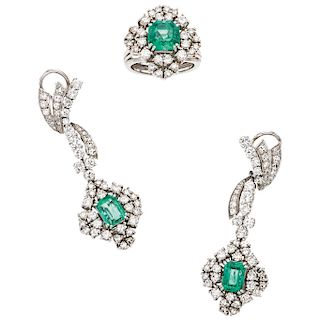 An emerald and diamond 14K white gold ring and pair of earrings set.
