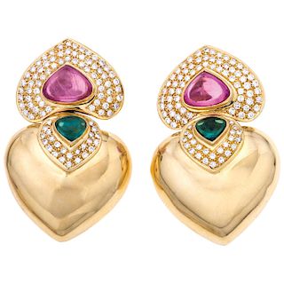 A tourmaline and diamond 18K yellow gold pair of earrings.