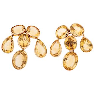 A citrine 14K yellow gold pair of earrings.