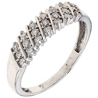 A diamond 14K white gold ring.