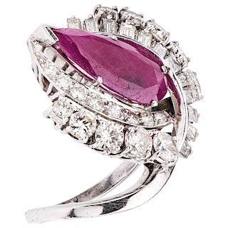 A ruby and diamond palladium silver ring.
