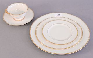 Franciscan porcelain dinnerware set marked Franciscan China made in California, with gold border, complete setting for eight. 71 tot...
