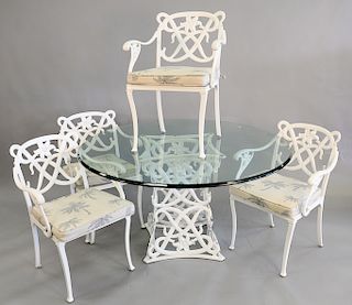 Five piece outdoor cast aluminum dining set attributed to Brown Jordan to include table with glass top along with four armchairs, ht...
