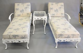 Three piece outdoor set attributed to Brown Jordan to include two chaises, lg. 70 in., and a glass top side table, ht. 24 in., top: ...
