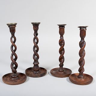 Two Pairs of Carved Wood Barley Twist Candlesticks