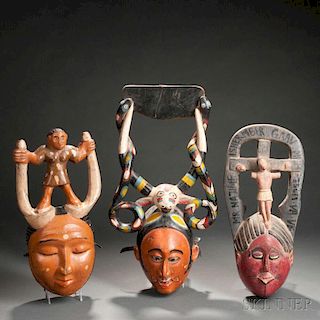 Three Ibibio Polychrome Carved Wood Face Masks