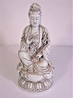 Blanc De Chine Marked Seated Guanyin with Lotus in Hand