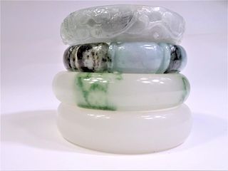 (4) Carved Green and White Stone Bracelets
