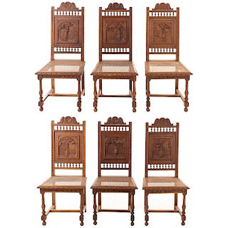 Lote de 6 sillas. Francia. Siglo XX. Estilo Bretón. En talla de madera de roble. Con respaldos semiabiertos, asientos de bejuco.