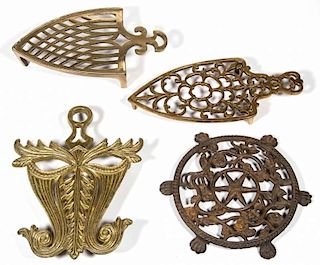 ASSORTED BRASS AND IRON TRIVETS, LOT OF FOUR