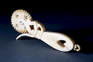 CARVED WHALE IVORY PIE CRIMPER