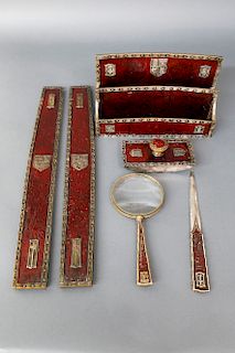 TIFFANY STUDIOS HERALDIC PATTERN SILVERED AND RED PATINATED BRONZE SIX-PIECE DESK SET