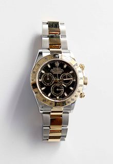 ROLEX OYSTER PERPETUAL COSMOGRAPH DAYTONA STAINLESS STEEL AND 18K YELLOW GOLD WATCH