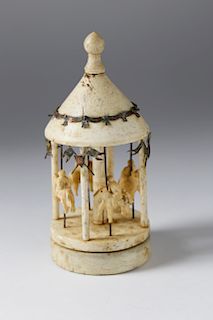 WHALEMAN CARVED WHALEBONE ROTATING TOY CAROUSEL