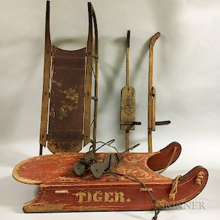 Two Painted Iron and Wood Sleds, a Pair of Ice Skates, and a Pair of Skis