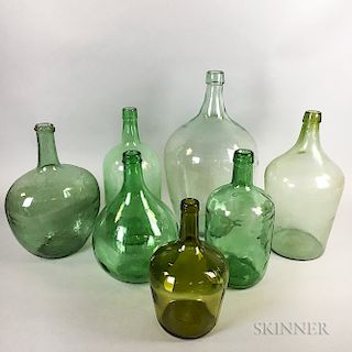 Seven Aqua, Green, and Olive Glass Bottles