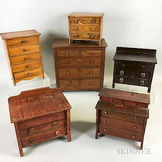 Six Walnut, Maple, and Pine Miniature Bureaus