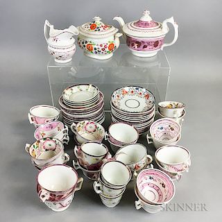 Approximately Sixty-two Pieces of Floral-decorated Pink Lustre Teaware.  Estimate $200-300